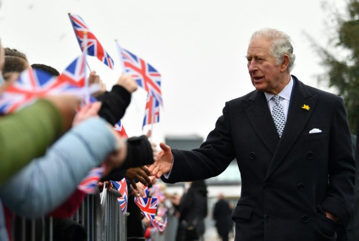 Prince Charles told members of the public his mother was now 'a lot better'