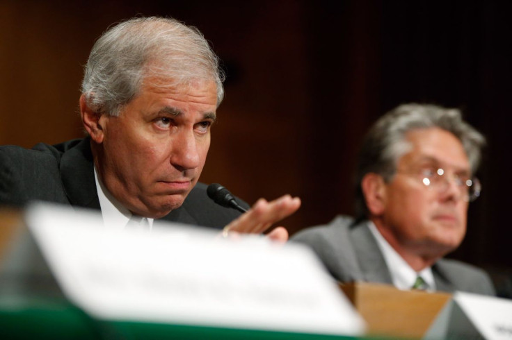 U.S. Federal Deposit Insurance Corporation Chairman Martin Gruenberg (L) and Comptroller of the Currency Thomas Curry testify about Wall Street reform before a Senate Banking Committee hearing on Capitol Hill in Washington September 9, 2014. 