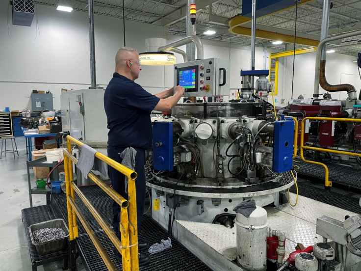 A worker operates one of the metal cutting machines at Gent Machine Co.'s factory in Cleveland, Ohio, U.S., May 26, 2021. 