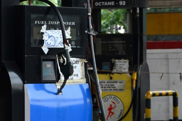 Boards reading 'No fuel' are seen at a closed Ceylon Petroleum Corporation fuel station in Colombo -- Sri Lanka is imposing power cuts as its foreign exchange crisis leaves it unable to import oil