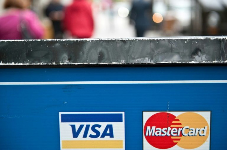 Visa and Mastercard said they were cutting off access to sanctioned Russian banks and individuals following sanctions from western governments