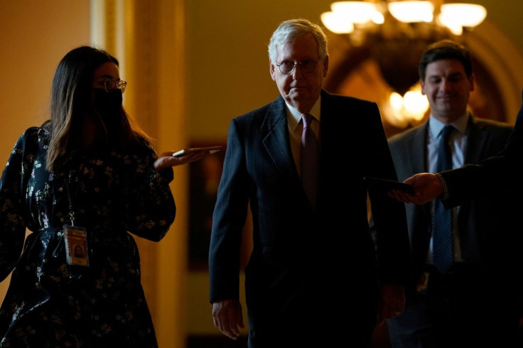 U.S. Senate Minority Leader Mitch McConnell (R-KY) walks from the Senate chamber to his office at the U.S. Capitol in Washington, U.S., February 17, 2022.