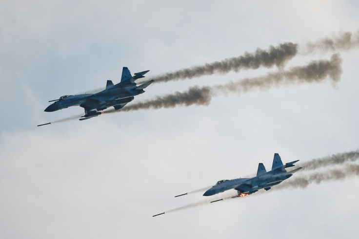 Russian Sukhoi Su-35 jet fighters fire missiles during the Aviadarts competition outside Ryazan