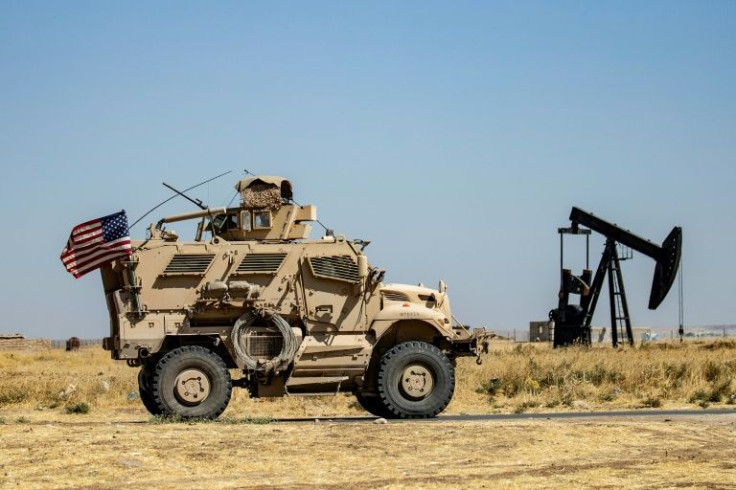 A US military vehicle patrols near the Rumaylan (Rmeilan) oil fields in Syria's Kurdish-controlled northeastern Hasakeh province, on September 17, 2020