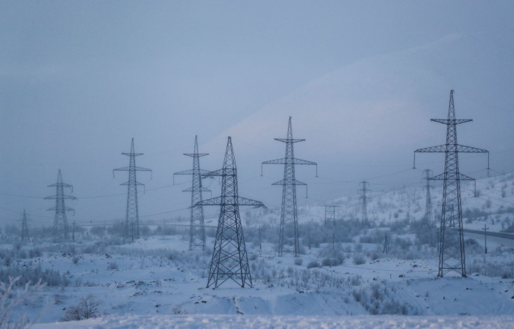 Power transmission lines are seen on a frosty day outside the town of Monchegorsk in Murmansk region, Russia October 31, 2019.