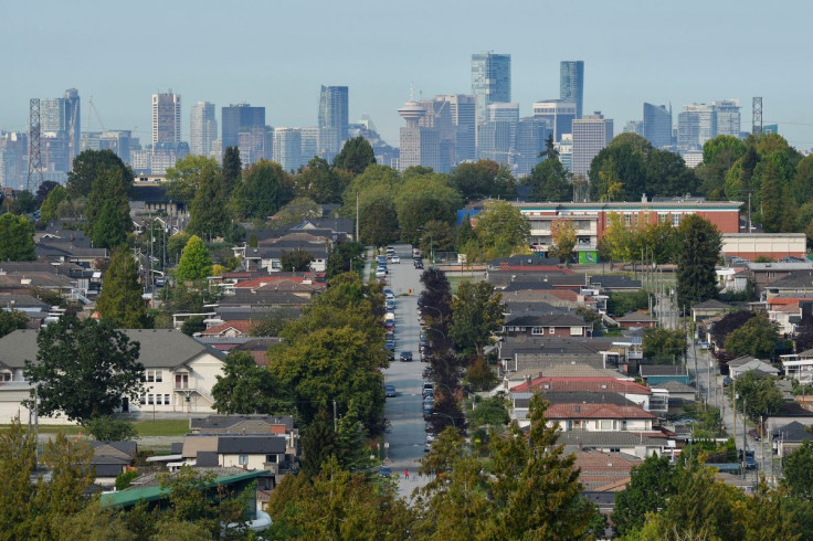 Single family homes are seen against the skyline of Vancouver, British Columbia, Canada September 30, 2020. 