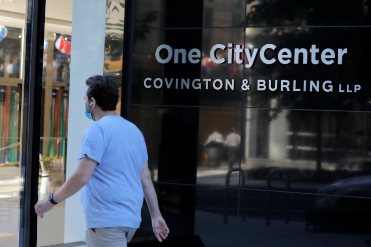 Signage is seen outside of the law firm Covington & Burling LLP in Washington, D.C., U.S., August 30, 2020.