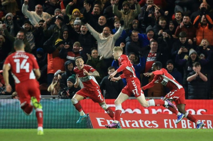 Up for the Cup: Middlesbrough's Josh Coburn (centre) celebrates the winning goal against Tottenham