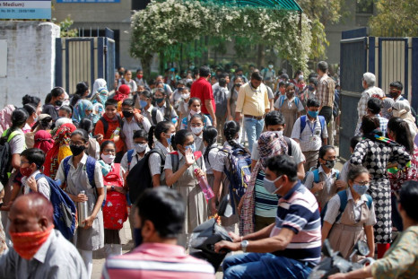 Students leave school after a majority of schools were reopened following their closure due to the coronavirus disease (COVID-19) pandemic, in Ahmedabad, India, February 24, 2022. 