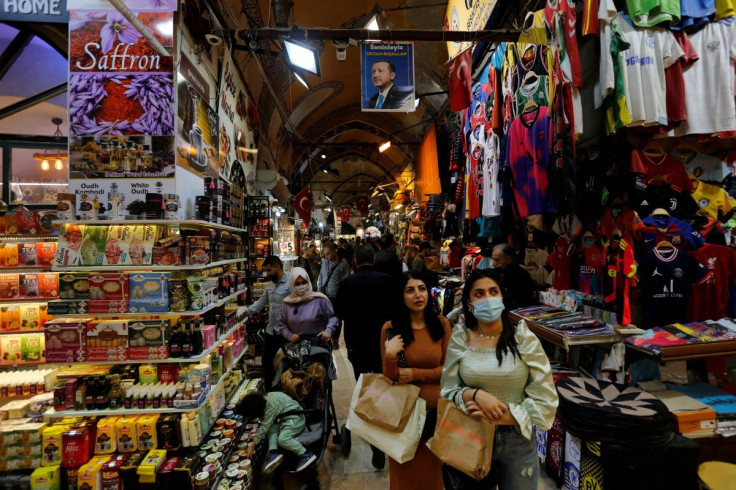 Locals and foreign tourists shop at the Grand Bazaar in Istanbul, Turkey, October 21, 2021.
