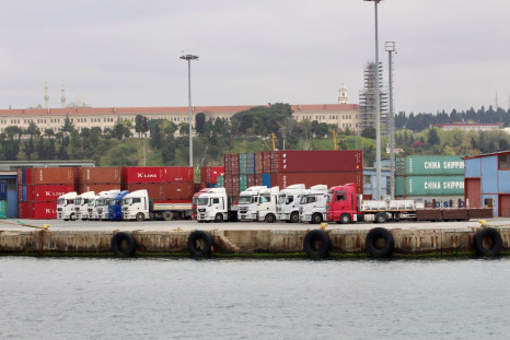 Trucks and shipping containers are pictured at Haydarpasa port in Istanbul, Turkey April 18, 2018. 