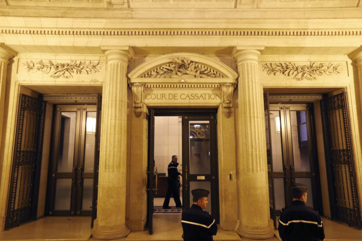 French gendarmes stand in front of France's highest court (Cour de Cassation) in Paris February 13, 2014 as the court examines appeal by former Societe Generale trader Jerome Kerviel against his 3 years jail sentence and 4.9 billion euros fine.  