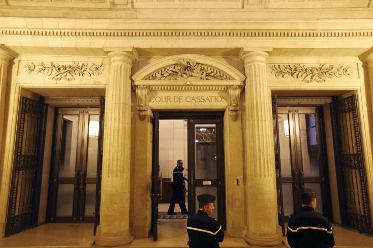 French gendarmes stand in front of France's highest court (Cour de Cassation) in Paris February 13, 2014 as the court examines appeal by former Societe Generale trader Jerome Kerviel against his 3 years jail sentence and 4.9 billion euros fine.
