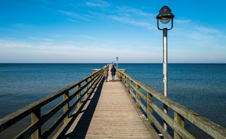 At the tranquil seaside village of just over 2,000 inhabitants, residents are still equally torn over the pipeline