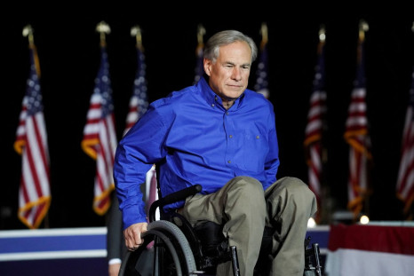 Texas Governor Greg Abbott attends former U.S. President Donald Trump's rally in Conroe, Texas, U.S., January 29, 2022. 