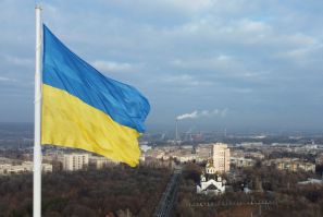 The national flag of Ukraine flies over the town of Kramatorsk, Ukraine November 25, 2021.  