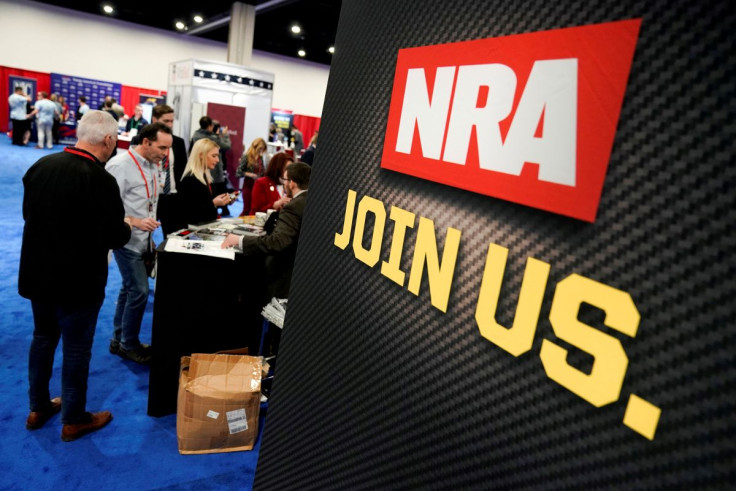 Attendees sign up at the National Rifle Association (NRA) booth at the Conservative Political Action Conference (CPAC) annual meeting at National Harbor in Oxon Hill, Maryland, U.S., February 27, 2020.  