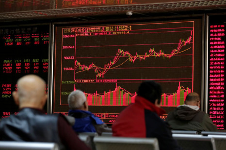 A board shows stock information at a brokerage office in Beijing, China January 2, 2020. 