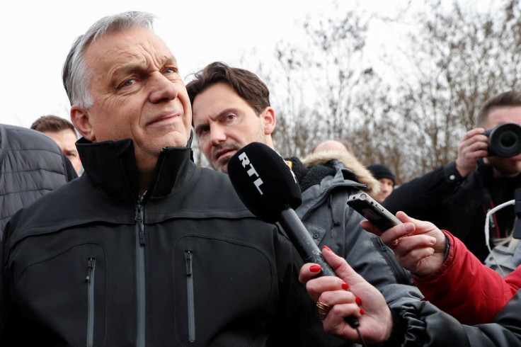 Hungarian Prime Minister Viktor Orban speaks to the media as he visits the Ukraine-Hungary border where people cross into the country to flee the Russian massive military operation against Ukraine, in Beregsurany, Hungary, February 26, 2022.