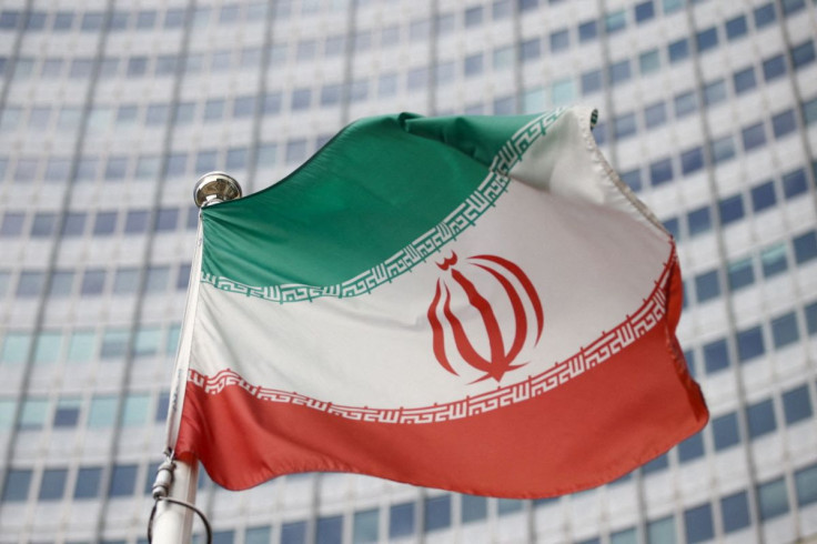 The Iranian flag waves in front of the International Atomic Energy Agency (IAEA) headquarters in Vienna, Austria, March 1, 2021.
