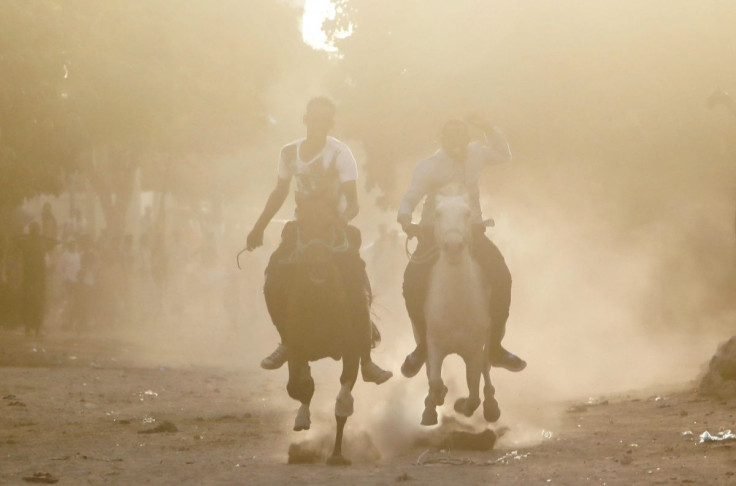 Somali students from the Yahya Fardoole horse training centre participate in horse racing as part of their training within a neighbourhood in the Yaqshid District of Mogadishu, Somalia February 25, 2022. Picture taken February 25, 2022.