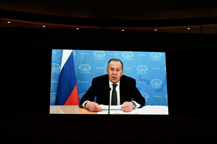 Russian Foreign Minister Sergei Lavrov addresses the Conference on Disarmament with a pre-recorded video message in Geneva, Switzerland, March 1, 2022. Fabrice Coffrini / Pool via
