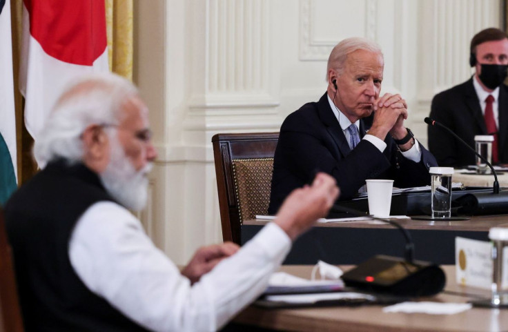 U.S. President Joe Biden listens as India's Prime Minister Narendra Modi speaks during a 'Quad nations' meeting at the Leaders' Summit of the Quadrilateral Framework held in the East Room at the White House in Washington, U.S., September 24, 2021.