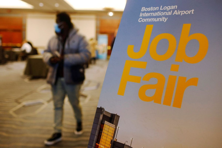 A job seeker leaves the job fair for airport related employment at Logan International Airport in Boston, Massachusetts, U.S., December 7, 2021.   