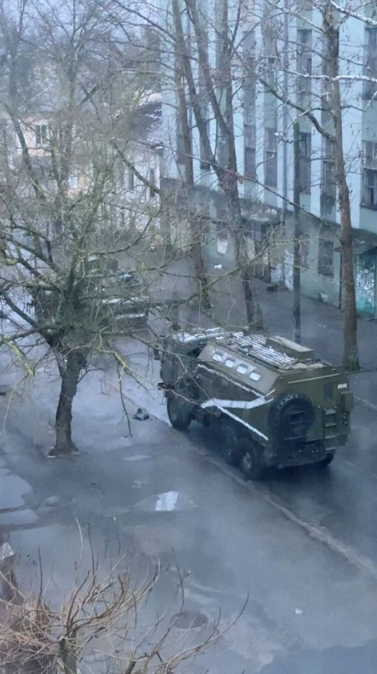 A military truck and tank are seen on a street of Kherson, Ukraine March 1, 2022, in this screen grab from a video obtained by Reuters on March 2, 2022. VIDEO OBTAINED BY 