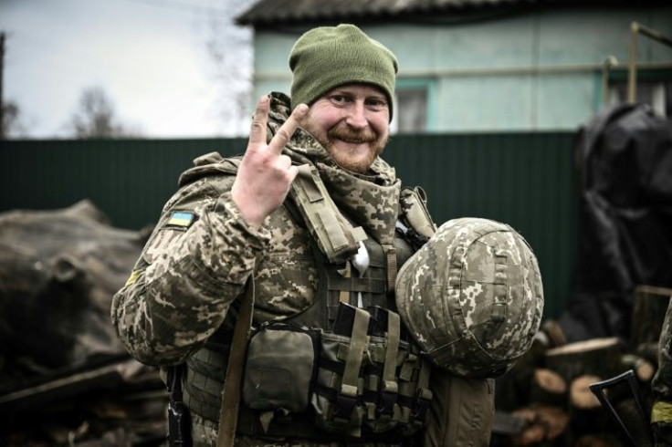 Ukrainians are not sitting idle with Ukraine's armed forces joined by eager but volunteer units who often man checkpoints with little more than hunting rifles and knives