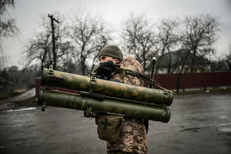 After the fall of a first major Ukrainian city to Russian forces, Putin appeared in no mood to heed a global clamour for hostilities to end