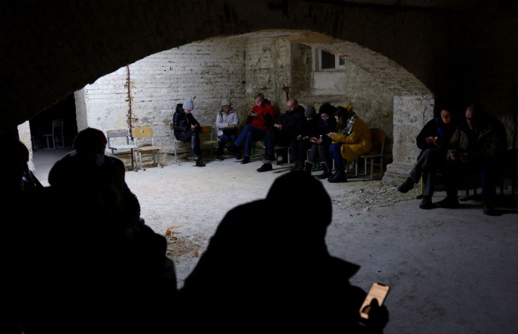 People take shelter in the basement of a school as air raid siren sounds are heard amid Russia?s invasion of Ukraine,  in Lviv, Ukraine, March 3, 2022.   