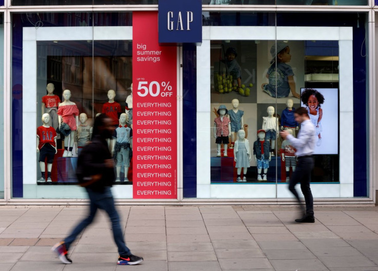 People walk past a Gap store on Oxford Street in London, Britain, July 1, 2021.