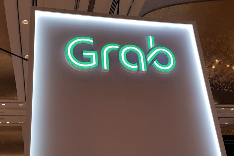 A Grab logo is pictured at the Money 20/20 Asia Fintech Trade Show in Singapore March 21, 2019. 