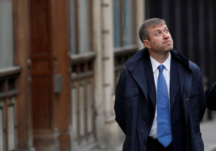 Chelsea Football Club owner Roman Abramovich walks past the High Court in London November 16, 2011.