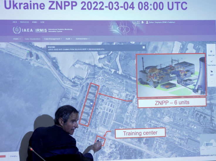 International Atomic Energy Agency (IAEA) Director General Rafael Grossi points on a map of a Ukrainian power plant during a news conference in Vienna, Austria March 4, 2022. 