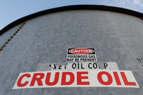 A sticker reads crude oil on the side of a storage tank in the Permian Basin in Mentone, Loving County, Texas, U.S. November 22, 2019. Picture taken November 22, 2019.   