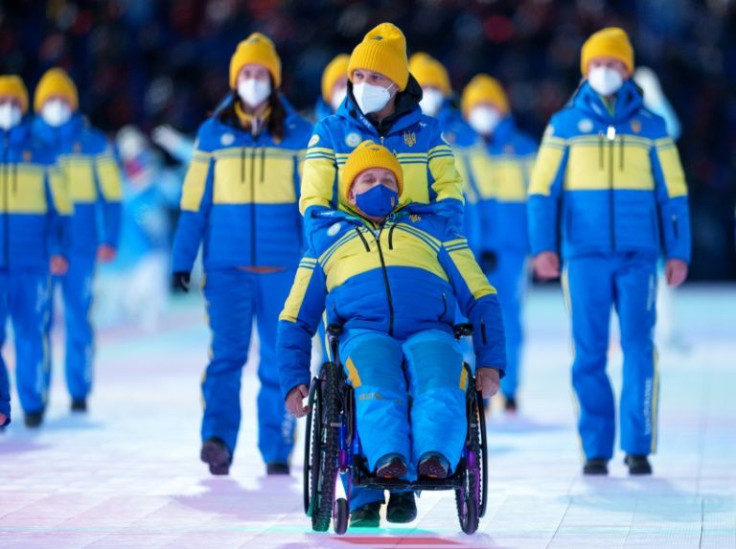 The Ukrainian team enters Beijing's National Stadium on Friday night