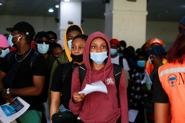 Nigerian students arrive at the Nnamdi Azikiwe International Airport from Ukraine after fleeing the invasion by Russia, in Abuja, Nigeria March 4, 2022. 