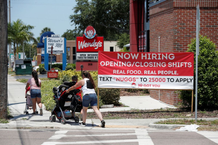 A Wendyâs restaurant displays a "Now Hiring" sign in Tampa, Florida, U.S., June 1, 2021.