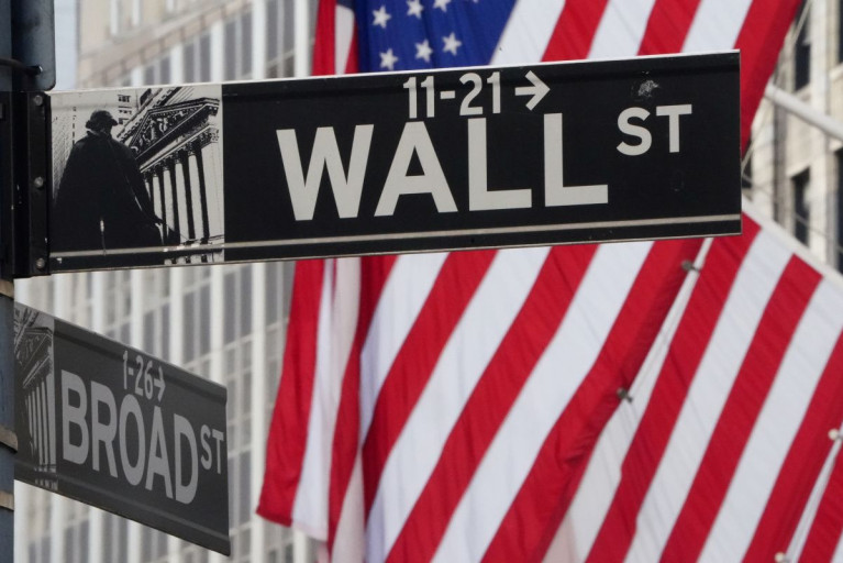 The Wall Street sign is pictured at the New York Stock exchange (NYSE) in the Manhattan borough of New York City, New York, U.S., March 9, 2020. 