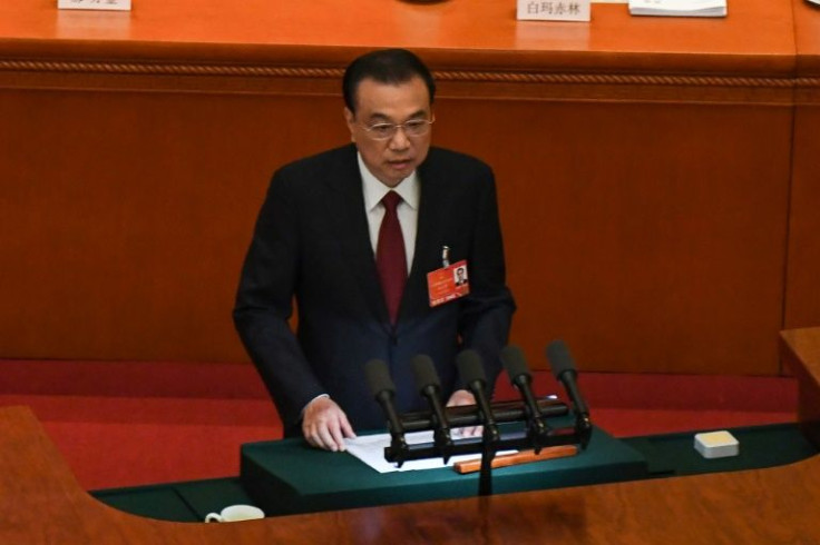 China's Premier Li Keqiang announced the unusually modest target -- the lowest since 1991 -- in his speech opening the annual session of China's rubber-stamp parliament