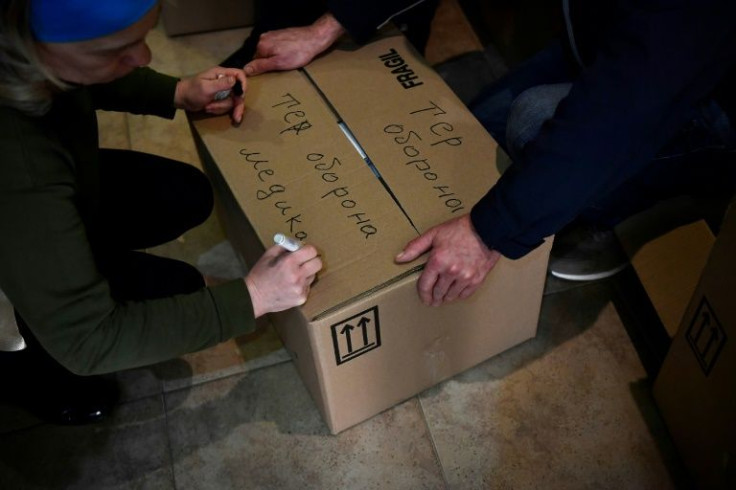 The contents of each box is clearly marked in Ukrainian while on the side is written in English 'From Catalonia'