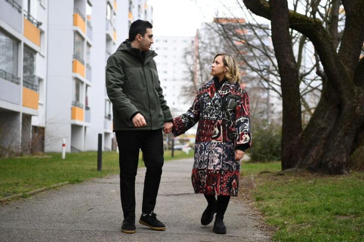 The Ukrainian-Syrian couple Anna Yarysh and Anas Modamani pose for a picture in Berlin, Germany, March 4, 2022.