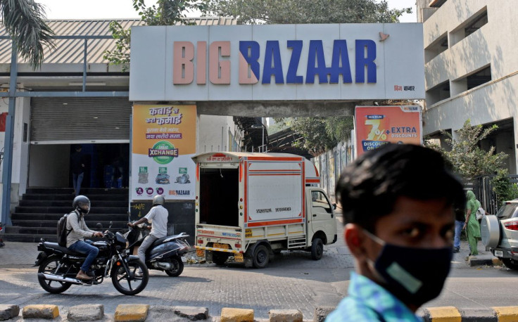 People move past a Future Retail's closed Big Bazaar retail store in Mumbai, March 2, 2022. Picture taken March 2, 2022.