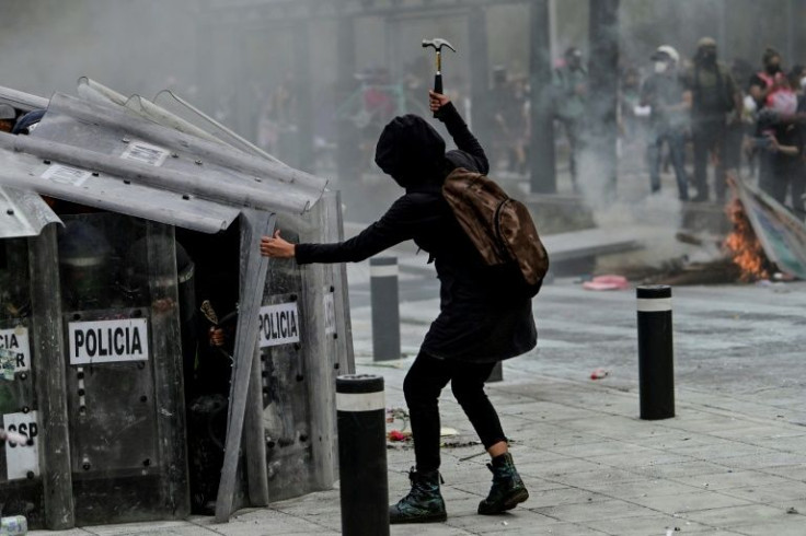 Protesters clash with police during a demonstration to mark International Women's Day in Mexico City last year