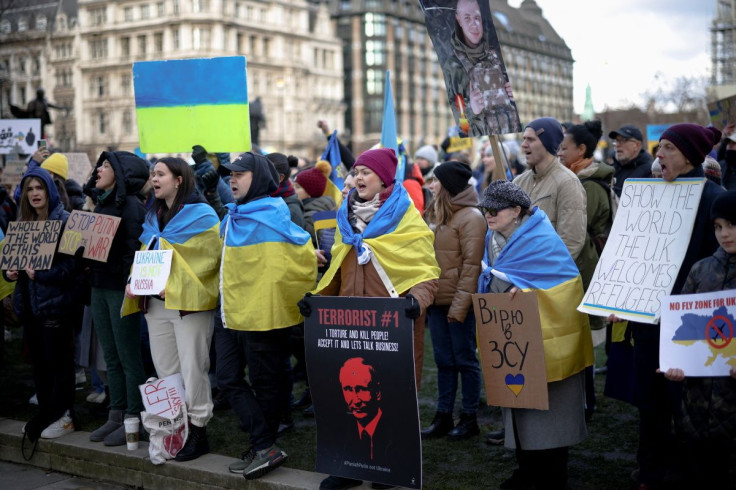 People attend a protest against Russia's invasion of Ukraine, at Parliament Square in London, Britain, March 6, 2022.