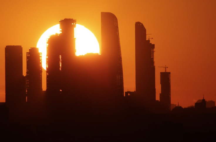 The sun sets behind the skyscrapers of the Moscow International Business Centre, also known as "Moskva-City", in Moscow, Russia April 23, 2018. 
