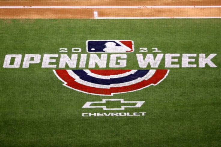 In this file photo taken on April 1, 2021, the 2021 Opening Week logo is painted on the field during the game between the Los Angeles Angels and the Chicago White Sox on Opening Day at Angel Stadium of Anaheim