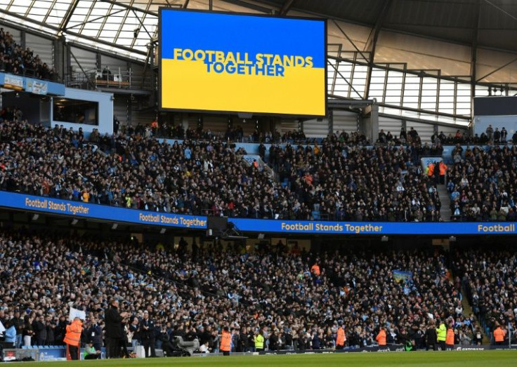 United in Manchester: A "Football Stands Together" message is displayed in the colours of the Ukrainian flag at the Etihad on Sunday
